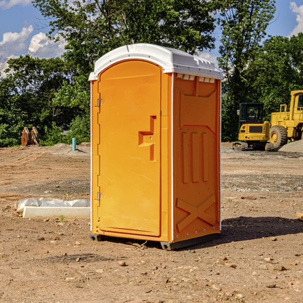 how often are the porta potties cleaned and serviced during a rental period in Munson